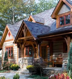 a house with stone and wood accents