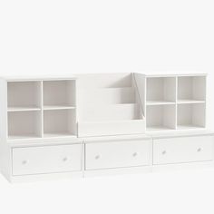 a white bookcase with drawers and shelves on each side, against a white background