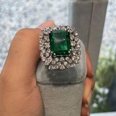 "𝐃𝐞𝐬𝐜𝐫𝐢𝐩𝐭𝐢𝐨𝐧 : *Cocktail Ring For Women, Green Emerald Cut CZ Stone Ring, 925 Silver Party Wear Ring, Wedding Bridal Ring, Engagement Anniversary Gift Ring. ❖ 𝐃𝐢𝐚𝐦𝐨𝐧𝐝 𝐃𝐞𝐭𝐚𝐢𝐥𝐬 *Color : White, Green *Clarity : VVS *Cut : Excellent *Center Stone Shape : Emerald Cut *Center Stone Size : 11*9 MM *Center Stone Weight : 5.21 CT *Side Stone Size : 1.60, 1.70, 2.00 MM *Side Stone Weight : 1.30 CT  *Total Carat Weight : 6.51 CT (Approx.) *Type : Cubic Zirconia (CZ) *We have all types of fancy & color Gemstone. For more queries please contact us immediately. ❖ 𝐑𝐢𝐧𝐠 𝐃𝐞𝐭𝐚𝐢𝐥𝐬 *Metal Purity : Solid Gold (10K, 14K, 18K); 925 Sterling Silver *Stamp : Yes (As per metal purity) *SKU : SR16379 *Making Process : Handmade > Crafted by our experienced craftsman. ❖ 𝐂𝐮𝐬𝐭𝐨𝐦 Luxury Unique Green Diamond Ring, Luxury Green Topaz Ring For Anniversary, Luxury Silver Cluster Ring With Emerald, Elegant Platinum Emerald Cluster Ring, Luxury Diamond Ring With Center Stone For Party, Formal Cluster White Gold Emerald Ring, Formal Cluster Emerald Ring With Prong Setting, Formal Cluster Emerald Ring In White Gold, Elegant Brilliant Cut Rings For Party