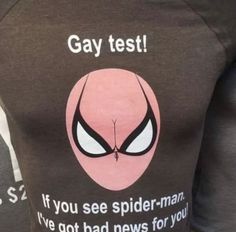 the back of a woman's t - shirt with an image of a spiderman on it