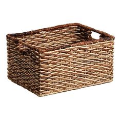 a brown wicker basket on a white background