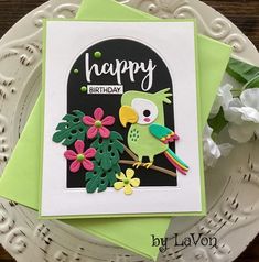 a card with a bird and flowers on it