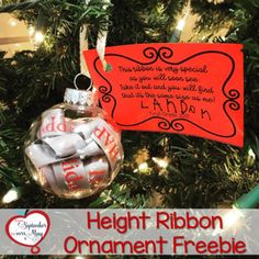 an ornament hanging from a christmas tree with the words height ribbon on it