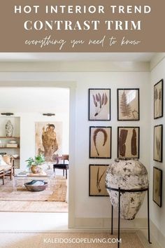 a living room with pictures on the wall and text overlay that reads, how to create a hot interior trend contrast trim everything you need to know