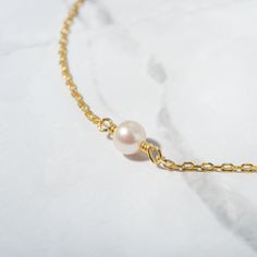 "A beautiful and elegant dainty freshwater pearl bracelet. This bracelet is great for stacking or worn on its own for a delicate and minimalist look! Also makes a great gift for bridesmaids! - - - D E T A I L S - - -  * Made of 925 Sterling Silver * THICK plating of 14k Gold or Rhodium for a piece that is made to last! * Available in 6.25\" or 6.75\" + .5\" extension chain  * Made of freshwater pearls * Nickel-free & Hypoallergenic  * Pearl Size: 3.5mm  * Lobster Clasp Closure  STAR BRACELET ON MODEL: https://www.etsy.com/listing/1553875483/star-bracelet-star-jewelry-charm Made with 100% Pure Love! ♡ Comes in a gift-box, ready for gift-giving! 🎁 Ships same day! ✈️ For fast delivery! 🚀 Happy to answer any questions you may have! 🥰 Bracelets on Model: Let's Connect! 🥰 IG: samijewels_" Pearl Bracelet Gold, Wedding Bands For Him, Gift For Bridesmaids, Pearl Bridal Jewelry, Bracelet Pearl, Jewelry Pearl, Freshwater Pearl Bracelet, Star Bracelet, Minimalist Bracelet