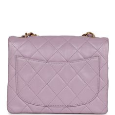 This Vintage Mini Square flap bag is of Light Purple Lambskin with matte gold hardware and has a front flap with signature CC turnlock closure, rear half moon pocket, and an interwoven purple leather and gold tone chain link shoulder/crossbody strap.The interior is lined in purple leather and features a zipper pocket with Chanel pull and an open pocket below.Collection: 6-Series (2000-2002)Origin: FranceCondition: Vintage; Excellent - This bag retains its shape with slight wrinkling, scratching Classic Purple Shoulder Bag, Classic Purple Formal Shoulder Bag, Classic Formal Purple Shoulder Bag, Luxury Purple Shoulder Bag With Gold-tone Hardware, Classic Purple Leather Shoulder Bag, Luxury Purple Shoulder Bag, Chanel Mini Square, Chanel Box, Chanel Mini