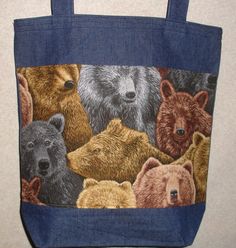 This NEW HANDMADE bag features a cute bears theme on the front pocket. The bag body measures approximately 16x16 inches by 4 inches deep. The straps are approximately 29 inches in length. The lined front bears print pocket is approximately 16 x 9 inches and has a velcro closure. This is a QUALITY handmade tote, made by us in our smoke free home in the Arkansas Ozarks. We use heavy denim and quality pocket materials to make this tote. We prewash the denim in non-perfumed detergent to reduce shrin Branson Mo, Bear Theme, Denim Tote Bags, Handmade Tote, Denim Tote, Wildlife Nature, Handmade Bag, Bear Print, Cute Bears