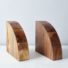 two pieces of wood sitting next to each other