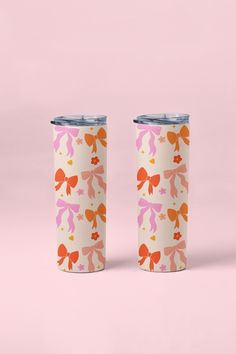 two pink and orange cups on a pink background