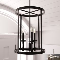 a black chandelier hanging from the ceiling