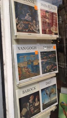 there are many books on display in the window