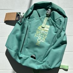 Color: Mint Padded Shoulder Straps And A Padded Back Panel Make The Youth Mini Recon Backpack Super Comfortable For Kids, While A Functional Design Helps Keep Things Organized For Whatever The Day May Bring. Features: Back Panel And Shoulder Straps Are Padded For Comfort And Are Sized Even Smaller Than Those For Our Classic Backpacks For Younger Kids Easy-To-Use S/R Buckle Secures Front Stuff-It Pocket Two External Water Bottle Pockets Spacious Internal, Zippered Compartment Divider Sleeve For O The North Face School Backpack With Adjustable Strap, Sporty The North Face School Bag, Green The North Face Backpack For Outdoor Activities, Green The North Face Outdoor Backpack, Green The North Face School Bag, The North Face Green Backpack For Outdoor, The North Face Green Standard Backpack, Green The North Face Backpack For Everyday, The North Face Green Backpack For Everyday Use