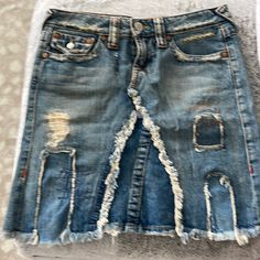 True Religion An Iconic Brand. Denim Skirt, Exquisite Details. Never Worn. See Measurements For Length And Waist. Distressed Blue Denim Skirt, Ripped Blue Denim Skirt, Ripped Denim Skirt In Blue, Blue Denim Ripped Skirt, Blue Ripped Denim Skirt, Distressed Mid-rise Blue Skirt, Mid-rise Distressed Blue Skirt, Skirts Vintage, True Religion