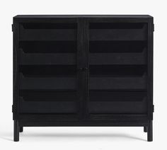 a black cabinet with two doors and shelves on one side, in front of a white background