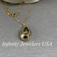 "The pendant pictured is a pear shaped simulated diamond #6884 -Approximate total carat weight: approx. 4.00ctw diamond equivalent -Center Stone Size: 13x9mm - approx. 4.00ct diamond equivalent -Center Stone Shape: pear -Gem Type: simulated diamond -Stone Clarity: VVS1 -Stone Color: D -Moh's Scale: 8.5 hardness -Metal Type and Purity: 14k yellow gold (also shown in 14k white gold) -Setting: bezel set -Chain: delicate 14k gold chain / heavier option with lobster claw available (use dropdown to se Diamond Teardrop Jewelry With Bezel Setting, Teardrop Diamond Jewelry With Bezel Setting, Yellow Gold Teardrop Jewelry With Bezel Setting, Gold Teardrop Jewelry With Bezel Setting, Anniversary Drop Necklace With Bezel Setting, Anniversary Drop Necklaces With Bezel Setting, 14k Gold Teardrop Jewelry With Bezel Setting, Cubic Zirconia Teardrop Jewelry With Bezel Setting, Teardrop Cubic Zirconia Jewelry With Bezel Setting