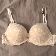 White Lace Dream Angels Push Up Bra 36b. Adjustable Straps. Hook Closure In Back. Brand New With Tags. Never Worn. White Feminine Bra With Lace Trim, White Lace Push-up Bra, White Delicate Lace Push-up Bra, Cream Bra With Delicate Lace, Fitted White Lace Bra, White Delicate Lace Fitted Bra, Cream Delicate Lace Bra, Fitted Cream Bra From Victoria's Secret, Spring Cream Bra