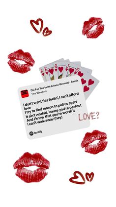 some red lipstick and playing cards on a white background