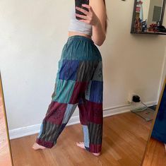 Beautiful boho patchwork hippie pants! Has colorful patchwork and stamps all over, waist goes to 30' and ties to fit any waist size smaller! Inseam is 28'. Bottoms are elasticized. Very comfy, I'm 5'2 for reference *coloring will vary slightly in each pair! Hippie Pants Outfit, Plus Size Hippie, Patchwork Pants, Boho Patchwork, Estilo Hippie, Hippie Pants, Hippie Style Clothing, Hippie Girl, Mode Boho