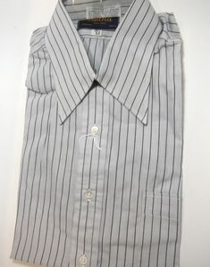 Vintage Sulka gray with black pinstripes, 100% cotton, never worn. Gray Button-up Shirt For Business, Classic Gray Shirt With Spread Collar, Classic Gray Spread Collar Tops, Classic Gray Tops With Spread Collar, Classic Gray Top With Spread Collar, Gray Cotton Business Shirt, Classic Gray Collared Shirt, Classic Gray Formal Shirt, Classic Gray Formal Tops