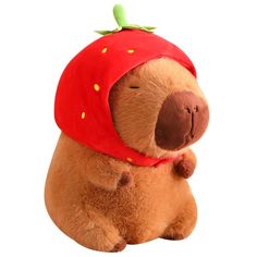 a stuffed animal wearing a strawberry hat