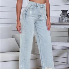 Light Wash High-Waist Ripped Baggy Jeans Size M ~Waist 29.5” ~Hip 39.4” ~Length 39.4” Baggy High Waist Bottoms With Frayed Hem, High Waist Baggy Bottoms With Frayed Hem, Casual Cropped Light Wash Bottoms, Blue Cropped Bottoms With Frayed Hem, Cropped Blue Bottoms With Frayed Hem, High Rise Light Blue Bottoms With Frayed Hem, Light Blue High Rise Bottoms With Frayed Hem, Casual Blue Cropped Pants, Casual Light Blue Bottoms With Frayed Hem