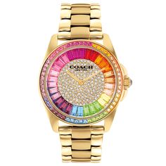 The epitome of refined sophistication, COACH Greyson is a polished, go-everywhere timepiece. This gold-tone bracelet design sparkles with a pave crystal dial accented with bright rainbow-hued pave crystals on the dial, markers and bezel. Gold-tone case and bracelet Approx. case diameter: 36mm Crystal accents Green dial Mineral crystal Quartz movement Deployment closure Water-resistant to 99 feet COACH Style #: 14504274 Dope Jewelry Accessories, Fancy Watches, Wrist Jewelry, Jewelry Accessories Ideas, Dope Jewelry, Girly Accessories, Jewelry Fashion Trends, Bracelet Design, Rainbow Crystal