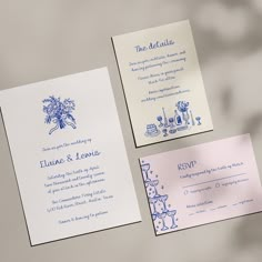 the wedding stationery is laid out on top of each other