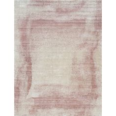 a beige and pink rug with an abstract design on the bottom, it is very soft