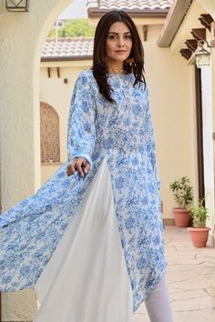 Shop for Palak and Mehak Blue Pure Crepe Tarini Floral Print Tunic With Tulip Pant for Women Online at Aza Fashions Blue Designer Palazzo Set For Spring, Spring Designer Blue Palazzo Set, Blue Bohemian Palazzo Set For Spring, Blue Traditional Drape Set For Spring, Spring Blue Traditional Drape Set, Blue Maxi Length Spring Sets, Blue Traditional Drape Kurta For Spring, Blue Kurta With Traditional Drape For Spring, Asymmetric Cape