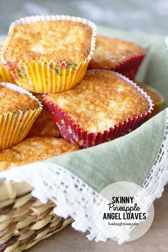 small cupcakes are sitting in a basket