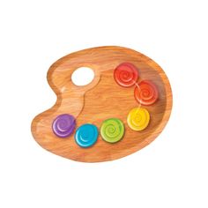 a wooden tray with different colored buttons on it