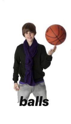 a young man holding a basketball in his right hand and the words balls above him