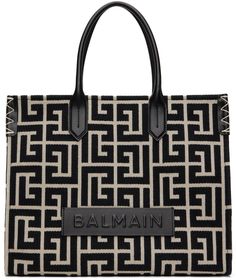 Cotton-blend twill tote in black and white. · Buffed calfskin trim throughout · Jacquard logo pattern throughout · Rolled fixed carry handles · Logo patch at face · Press-stud fastening at sides · Bumper pads at base · Lanyard-clasp closure · Patch pocket at interior · Detachable press-stud pouch · Canvas lining · Logo-engraved gold-tone hardware · H13 x W16.5 x D6.5 Supplier color: Ivoire/Noir Designer Black Bags With Monogram Print, Designer Monogram Print Shoulder Bag For Shopping, Luxury Bag With Monogram Print And Double Handle, Black Monogram Canvas Bag With Monogram Print, Black Monogram Canvas Bags With Monogram Print, Black Rectangular Shoulder Bag With Monogram Print, Black Bags With Monogram Print For Daily Use, Luxury Black Bag With Monogram Print, Luxury Black Bags With Monogram Print