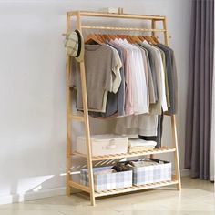 a wooden rack with clothes hanging on it