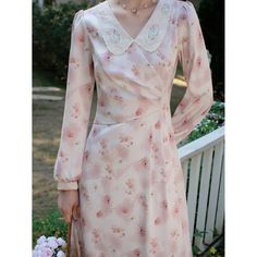 A dress depicting cherry blossom-colored flowers in full bloom in watercolor. Beautiful flowers are embroidered on the collar. The shading and blurred flower pattern gives a romantic impression. Let yourself be invited to a dazzling paradise created by gentle light. 
 
 
 Size 
 
 S size 
 
 Length: 118cm 
 Shoulder width: 34cm 
 Bust: 82-83cm 
 Waist: 68cm 
 Sleeve length: 60cm 
 
 M size 
 
 Length: 120cm 
 Shoulder width: 35cm 
 Bust: 86-87cm 
 Waist: 72cm 
 Sleeve length: 61cm 
 
 L size Elegant Pink Floral Dress For Spring, Delicate Floral Print Spring Dress, Feminine Floral Dress For Spring Wedding, Feminine Floral Spring Wedding Dress, Feminine Floral Wedding Dress For Spring, Delicate Floral Print Dress For Garden Party, Feminine Pink Floral Dress For Wedding, Feminine V-neck Floral Dress For Wedding, Elegant Long Sleeve Pink Floral Dress