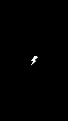 a black background with a white lightning bolt