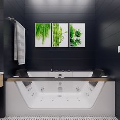 a white bath tub sitting inside of a bathroom