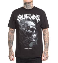 Introducing the Marshall Bennett Tee - Featuring an exclusive design by artist Marshall Bennett, this tee showcases a smoky skull graphic on the front and the back has Sullen written out from shoulder to shoulder with lettering by artist Sergio Martinez. Printed on our timeless and classic black standard tee. Standard Fit Tee Artist: Marshall Bennet @officialmarshalltattoo 100% cotton jersey Preshrunk to minimize shrinkage Tagless for comfort Woven Sullen Badge label on left sleeve Machine washa Alternative Skull Graphic Print T-shirt, Edgy Skull Graphic Print T-shirt, Skull Screen Print T-shirt For Concerts, Punk Skull Print T-shirt For Streetwear, Streetwear Graphic Tee With Skull Print, Urban T-shirt With Skull Print For Streetwear, Alternative Streetwear T-shirt With Skull Print, Urban Skull Print T-shirt For Streetwear, Edgy Skull Print T-shirt For Streetwear