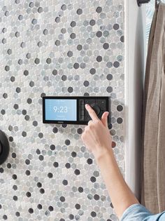 The Smart Shower is a Wi-Fi enabled digital shower that offers mobile connectivity and unmatched personalization, providing countless ways to create your ideal showering experience. The Smart Shower allows you to activate your shower in 3 different ways—voice controlled through a smart speaker, the Moen Smart Water App, and the in-shower controller. Within the smartphone App, you can create up to 12 personalized presets including name, greeting, outlets used, water temperature, shower timer, and Shower Controls, Cool Tech Gifts, Digital Showers, Minimalist Contemporary, Article Design, Shower Valve, Cool Tech, Shower Design, Shower Systems