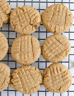 peanut butter cookies on a cooling rack ready to be baked in the oven for consumption