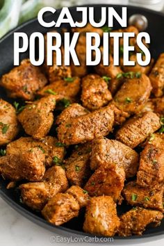 cajun pork bites in a skillet with the words cajun pork bites above it