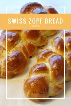 some breads are sitting on top of a cutting board with the words swiss zoff bread