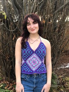 This halter top has a great 70's vibe with a little Alice in Wonderland too! Made of 5 granny squares, two granny triangles and great braided ties! Multicolor Halter Neck Top For Festivals, Hippie Halter Neck Crop Top, Halter Neck Crop Top Vest For The Beach, Fitted Halter Vest Top For Beach, Hippie Style Fitted Halter Top, Halter Neck Vest Top For Beach, Retro Summer Triangle Halter Top, Hippie Triangle Top For Spring, Beach Halter Neck Vest Top