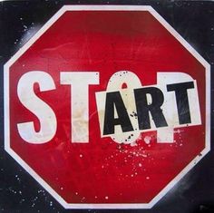 a red stop sign with the word start painted on it's bottom and underneath