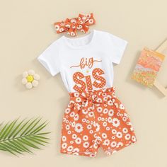 Please note that each outfit is sold separately. Little Sis Set Includes: Onesie, Shorts, & BowBig Sis Set Includes: T-shirt, Shorts, & Bow Material: Cotton Blend Gender: Girls Pattern: Letters, Floral Sleeve Length: Short Summary: Baby Toddler Short Sleeve White Orange Little Sis Onesie or Big Sis T-shirt with Matching Floral Shorts & Bow 3 Piece Outfit Set Matching Sister Sibling Outfits Cute Cotton Sets With Graphic Print, White Short Sleeve Sets For Spring, White Short Sleeve Spring Sets, Cute Printed Cotton Set, Cute Short Sleeve Sets With Graphic Print, Spring Short Sleeve Printed Sets, Casual Letter Print Sets For Spring, White Graphic Print Sets For Spring, White Matching Set Top For Spring