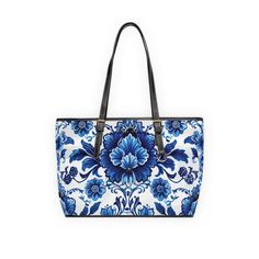 Embrace timeless elegance with our designer style large shoulder tote bag, featuring a striking blue and white floral pattern that echoes the classic beauty of traditional porcelain designs. This tote showcases detailed, elegant flowers and intricate foliage vividly rendered in deep blue against a stark white background, offering a refined and sophisticated look. Constructed with a spacious main compartment, this bag is perfect for carrying everyday essentials or for special occasions. The pract Elegant Floral Print Shopping Bag, Elegant Floral Print Shoulder Bag For Shopping, Elegant Floral Print Tote Bag, Elegant Floral Print Bag For Everyday Use, Elegant Floral Print Shoulder Bag For Everyday Use, Elegant Floral Print Shoulder Bag For Everyday, Elegant Floral Print Shoulder Bag, Luxury White Bags With Floral Print, Elegant Blue Bags With Floral Print