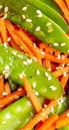 carrots, snap peas and sesame seeds mixed together