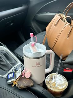 the contents of a car are neatly organized and ready to be used as a drink holder