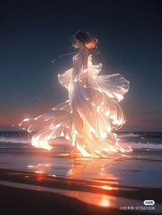 a woman standing on top of a sandy beach next to the ocean at night time