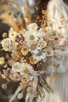 a bouquet of white flowers in a vase